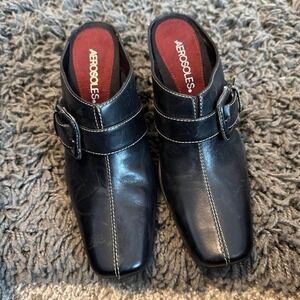 Black leather Aerosoles slip-on mules with buckle closure #leathermules